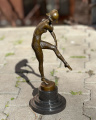 Bronzová socha Harlekýna